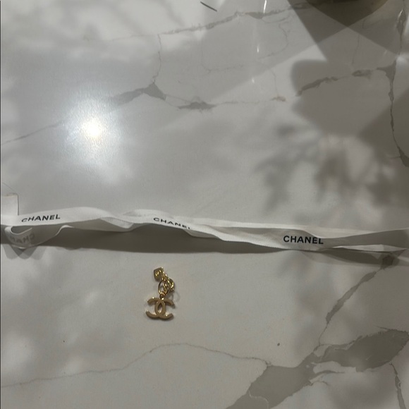 CHANEL Gold Logo Charm with White Ribbon - Picture 2 of 4